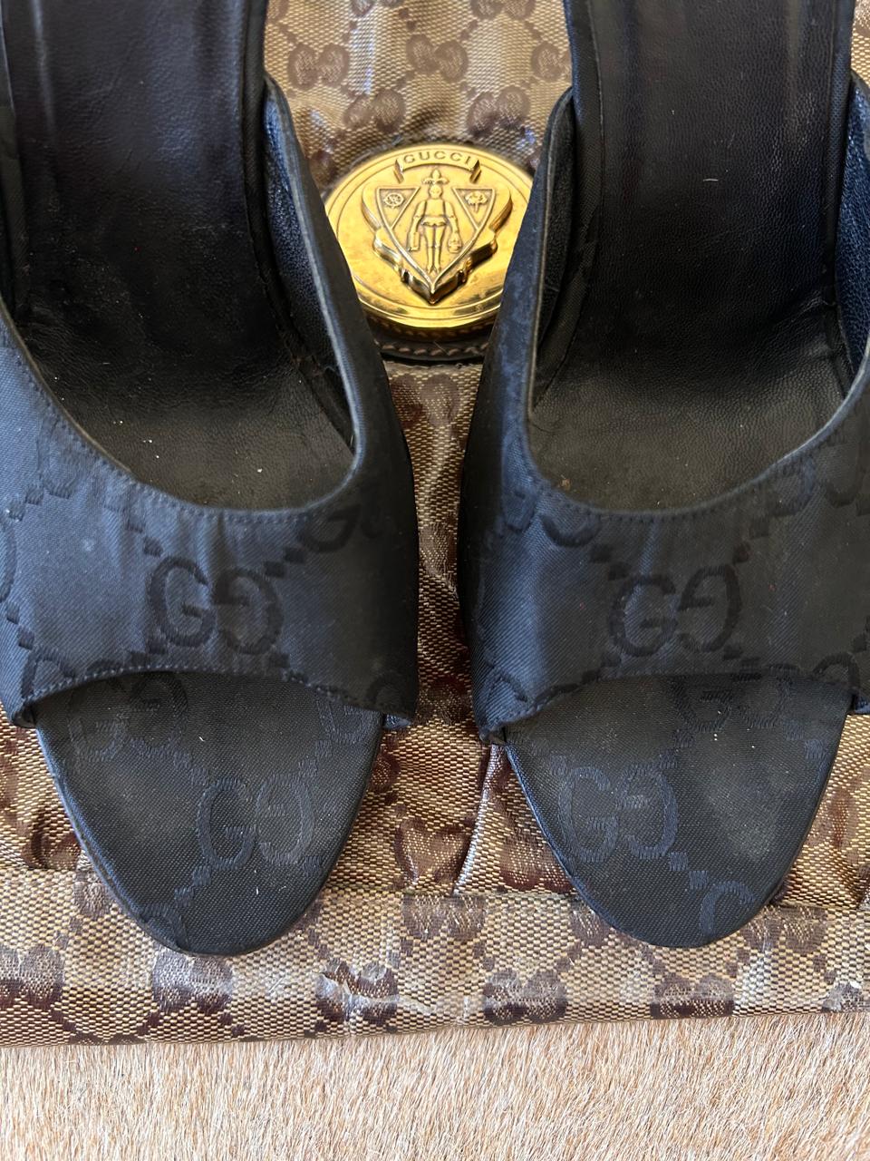 Gucci monogram heeled mules