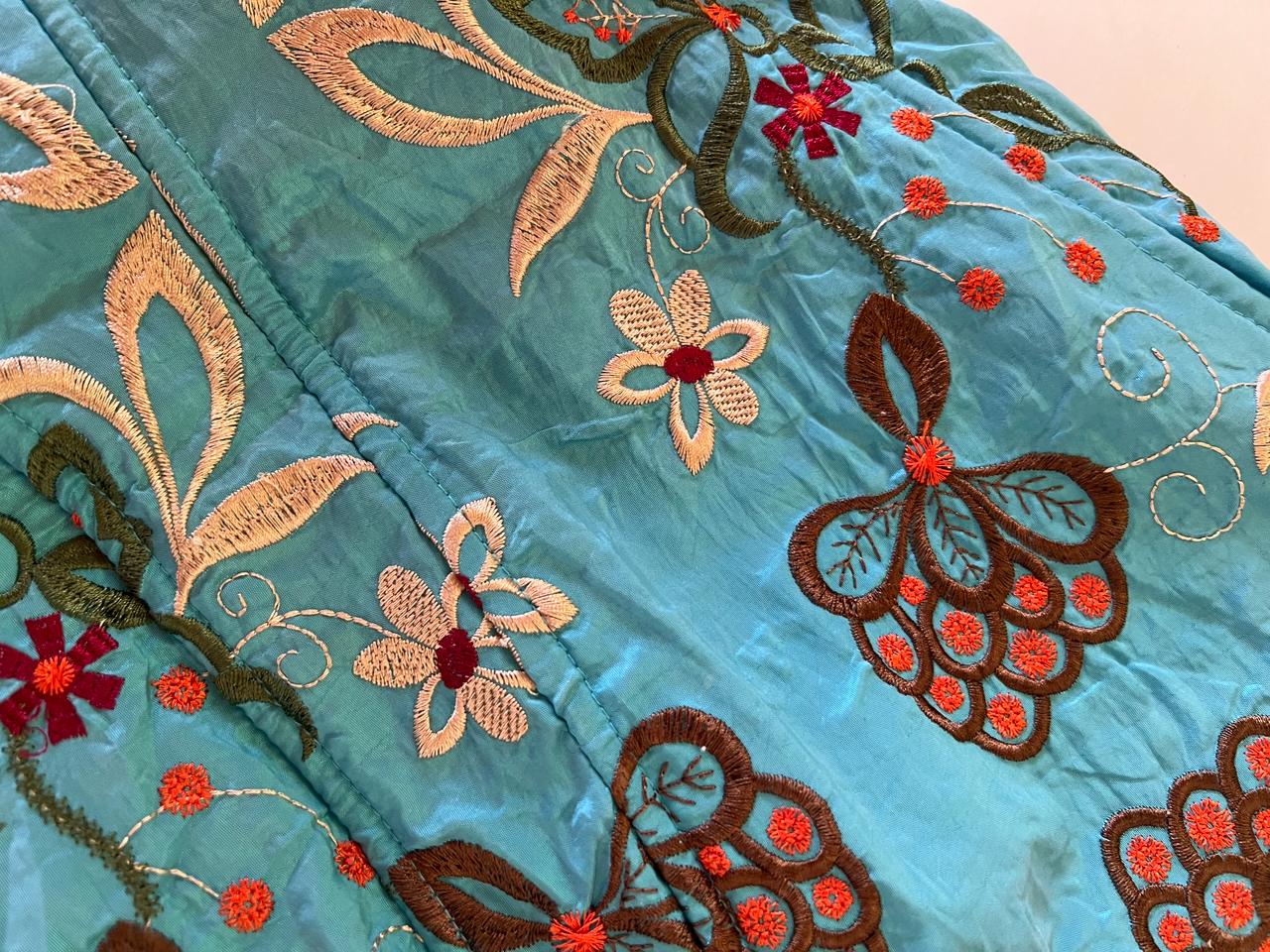 Blue embroidered corset top