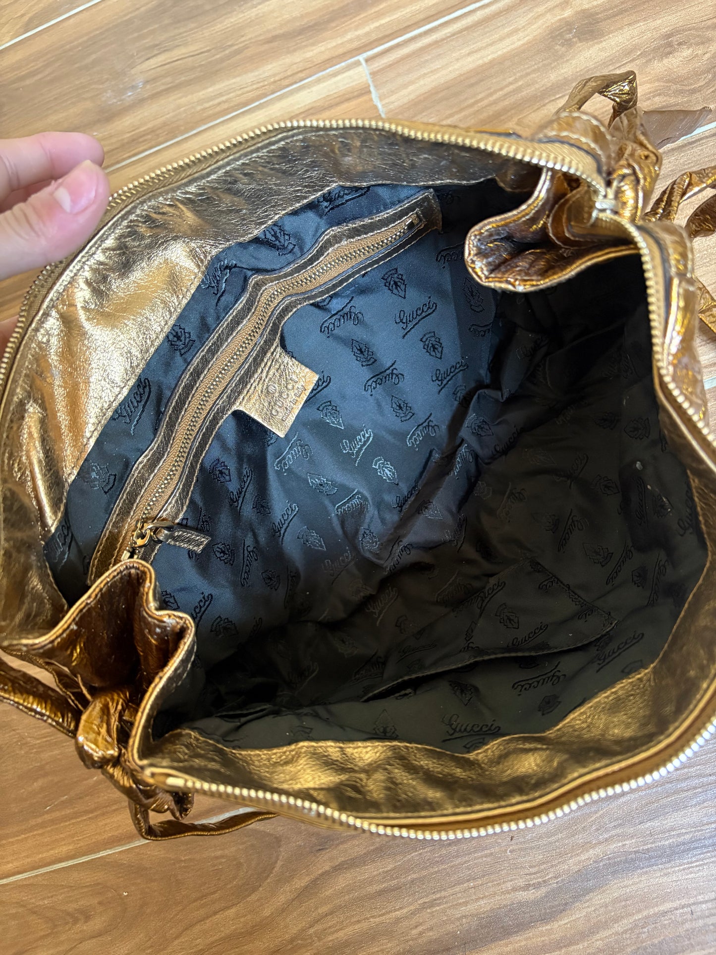 Gucci metallic gold clutch leather bag