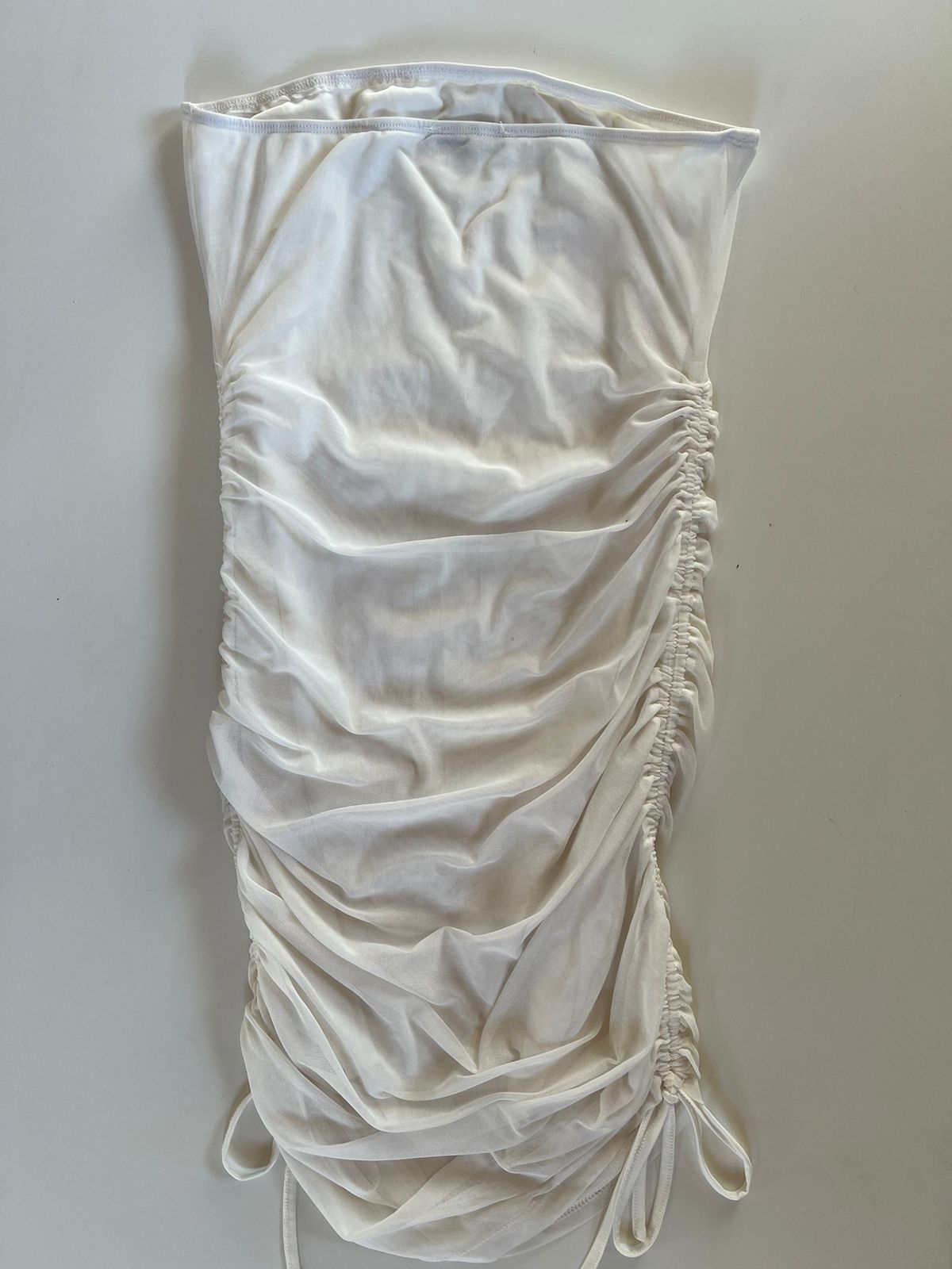White sleeveless mini layered mesh ruched dress