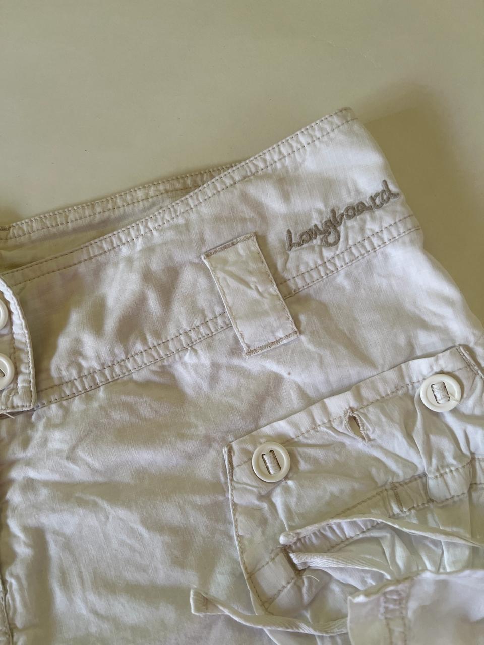 White denim mini cargo skirt with shorts underneath