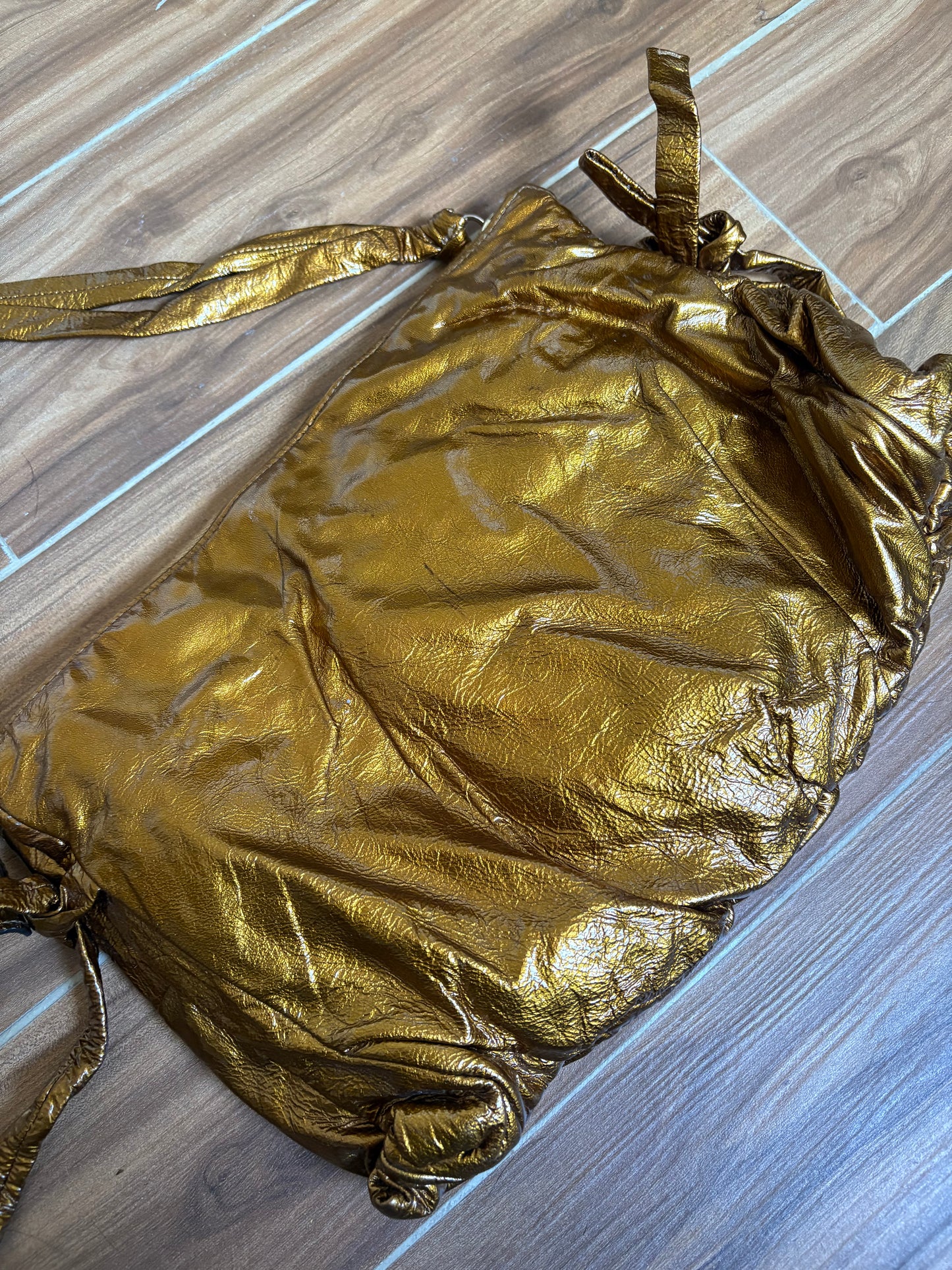 Gucci metallic gold clutch leather bag