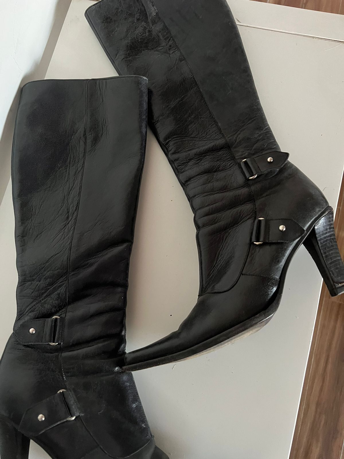 Vintage black leather pointy knee high boots