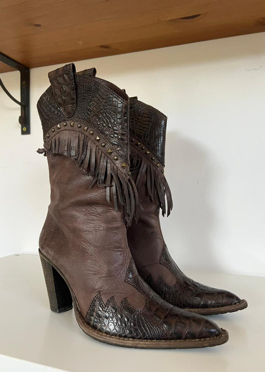 Leather fringed pointy snake heeled boots