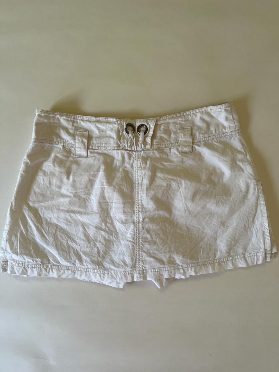 White denim mini cargo skirt with shorts underneath