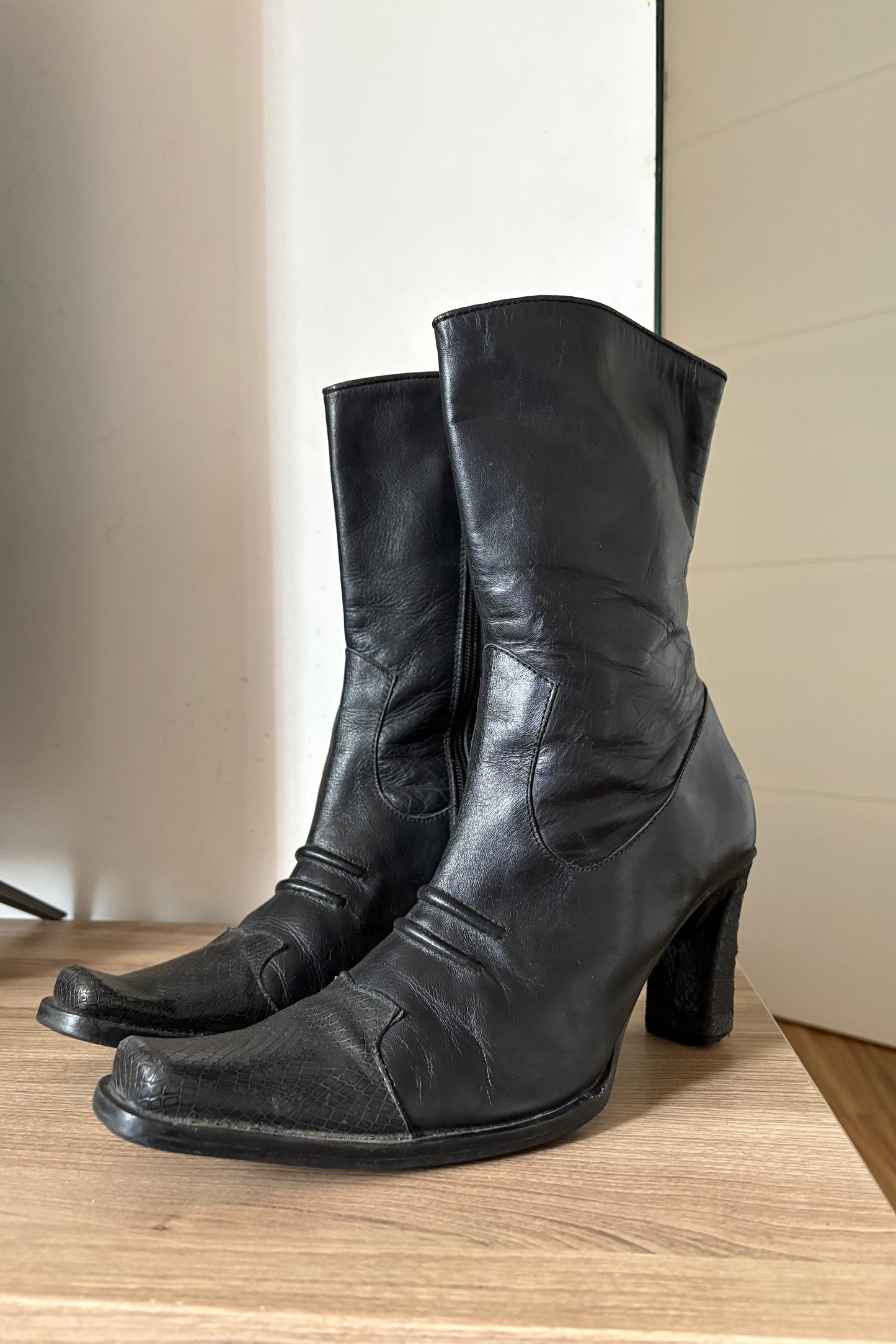 Black leather heeled boots