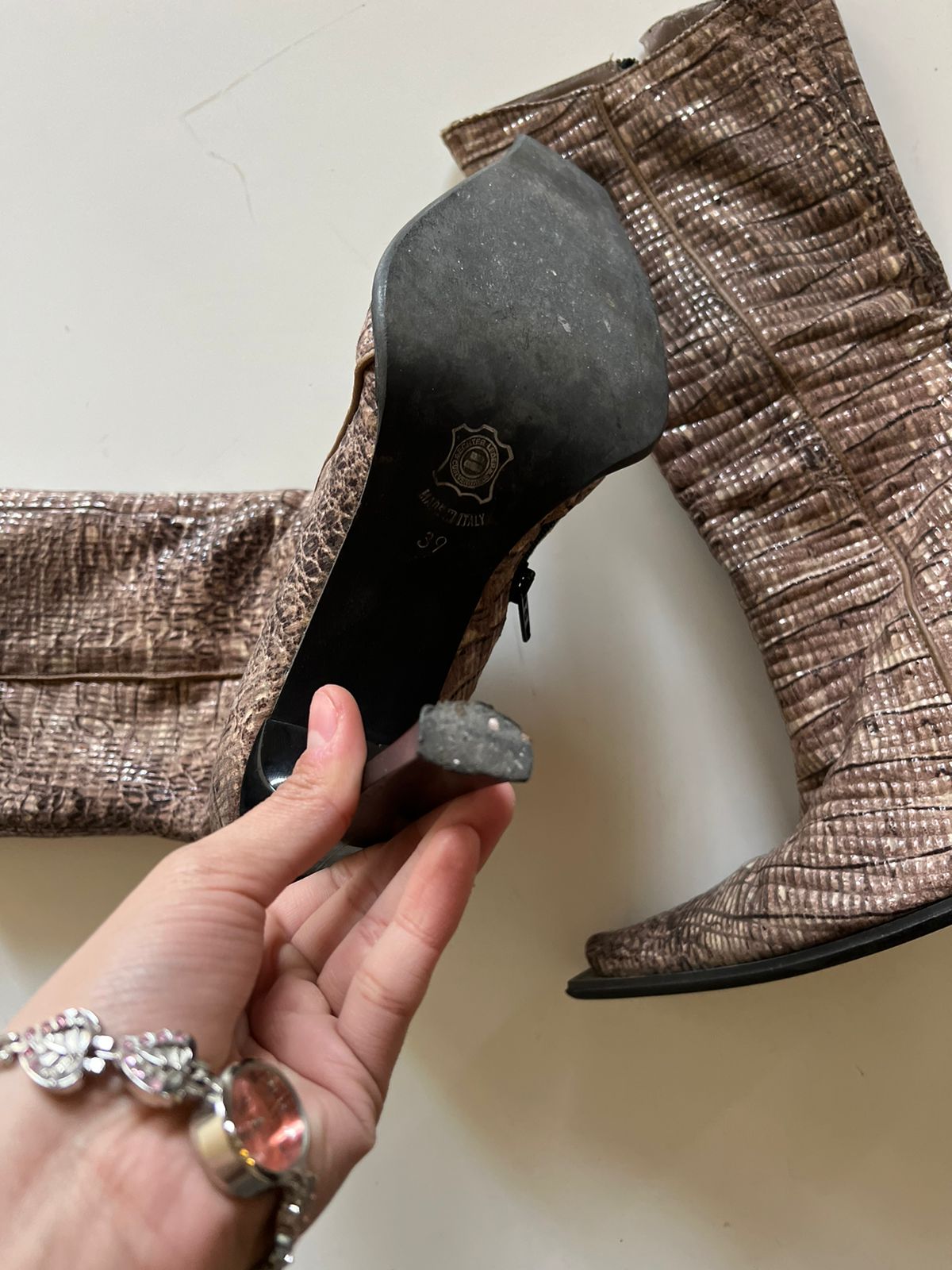 Snake pointed heeled boots