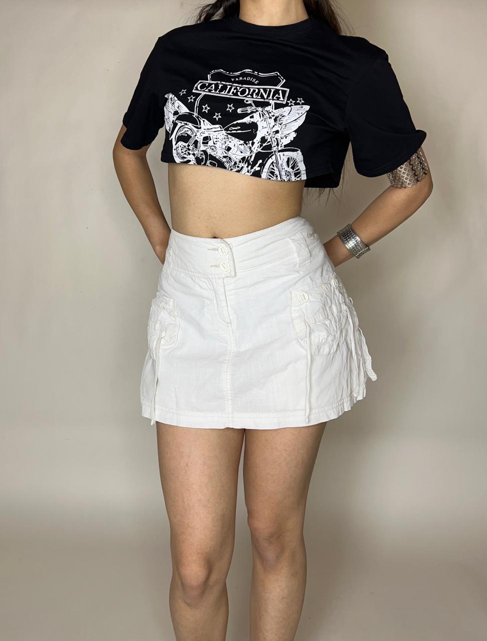 White denim mini cargo skirt with shorts underneath