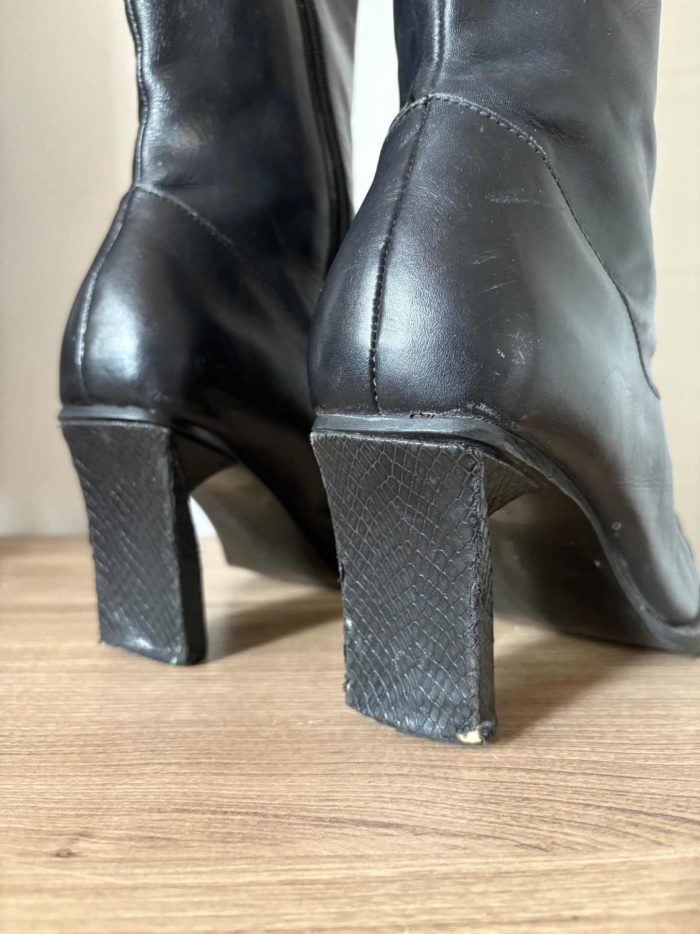 Black leather heeled boots