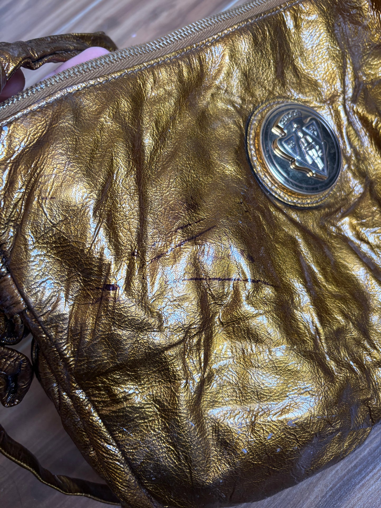 Gucci metallic gold clutch leather bag