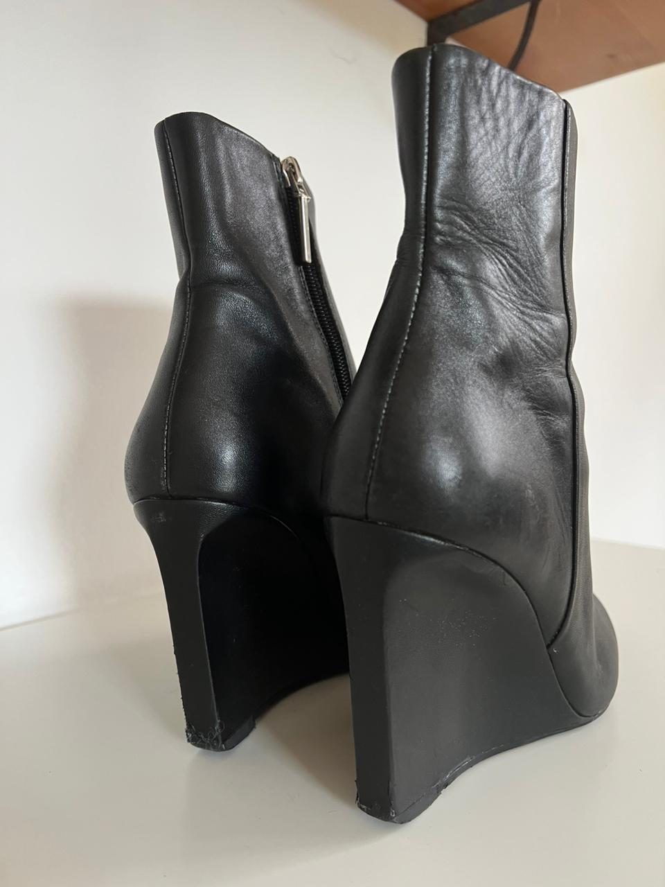 Black leather wedge heeled pointy boots