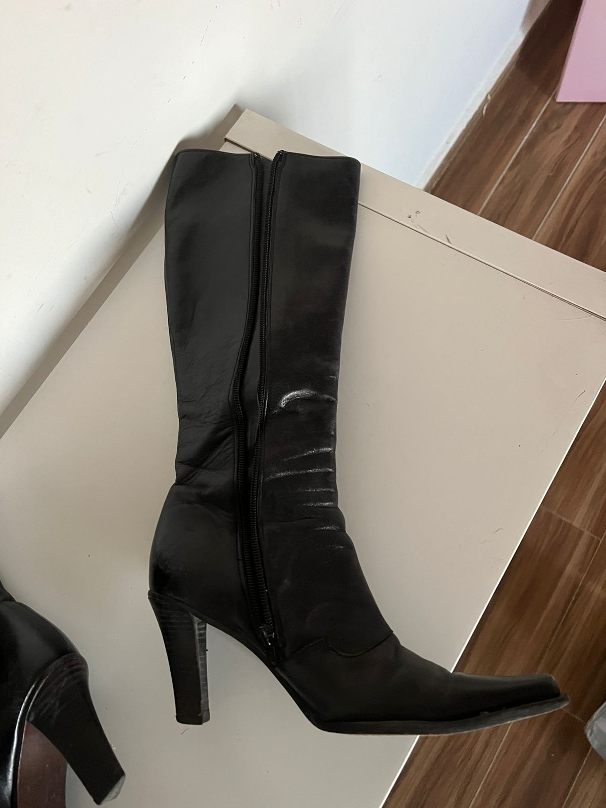 Vintage black leather pointy knee high boots