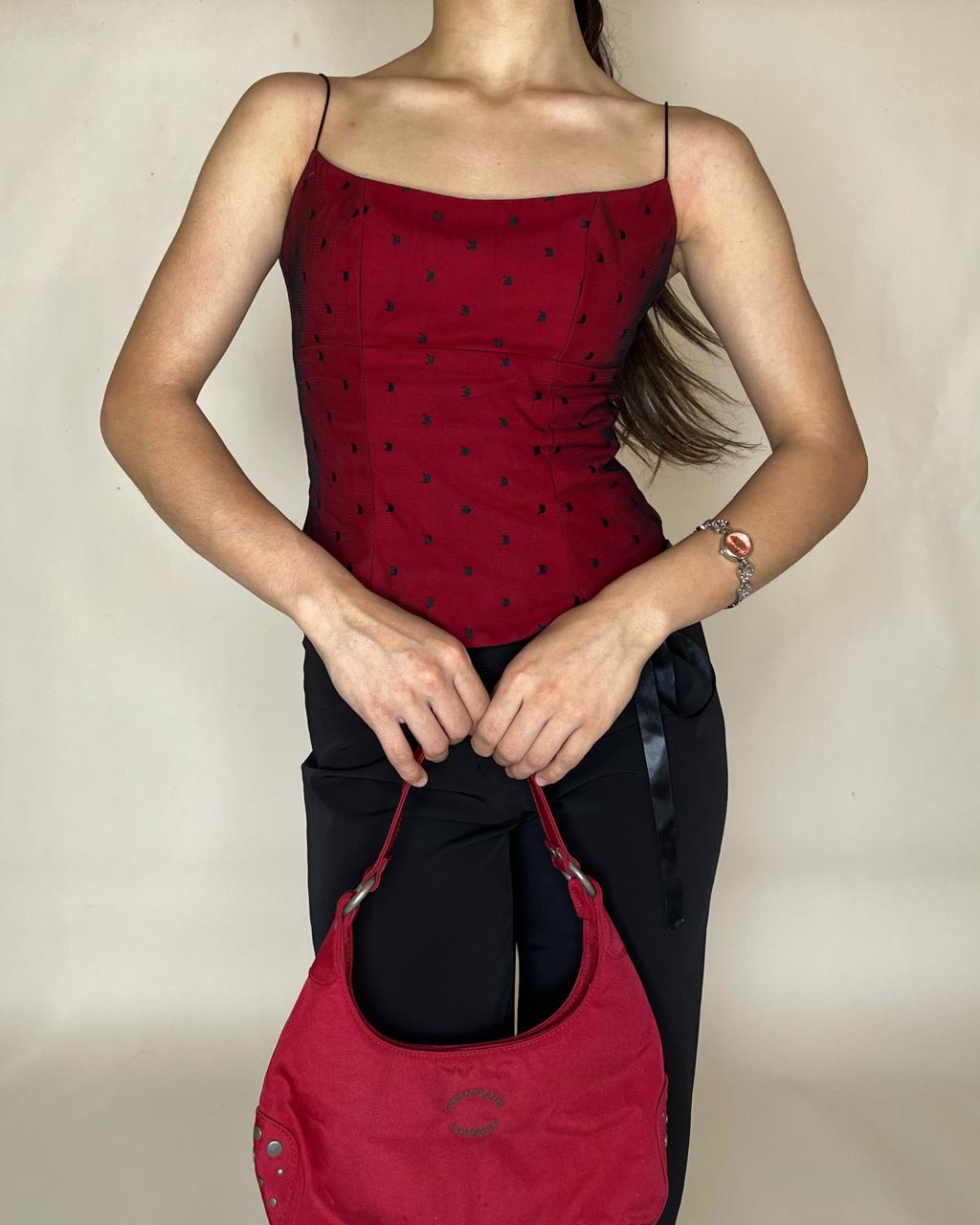 Corset top in black polka dots