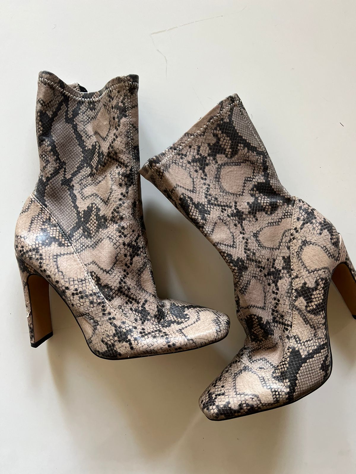 Snake round toe heeled ankle high boots