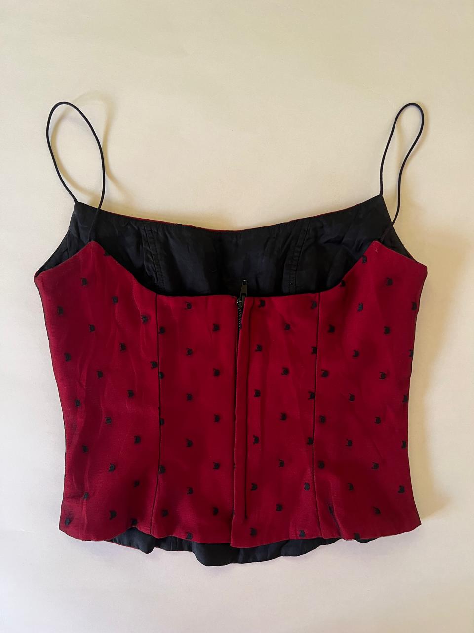 Corset top in black polka dots