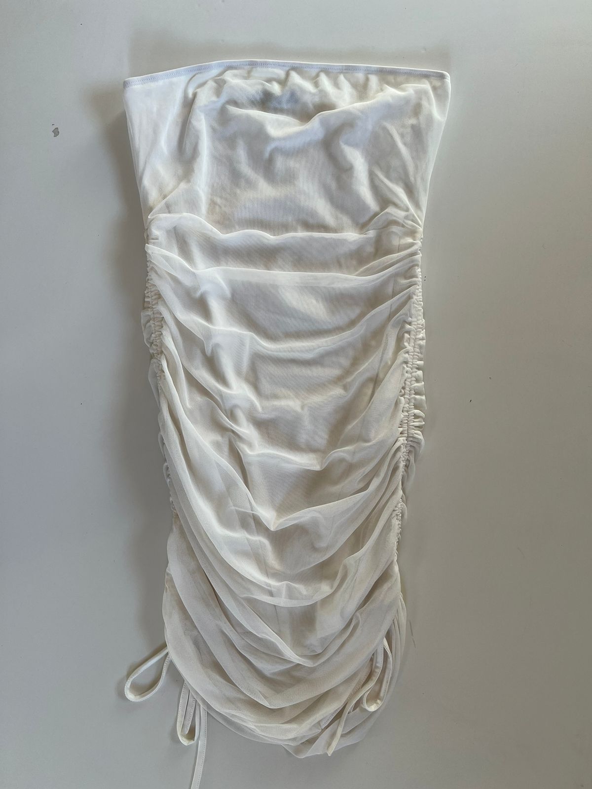 White sleeveless mini layered mesh ruched dress